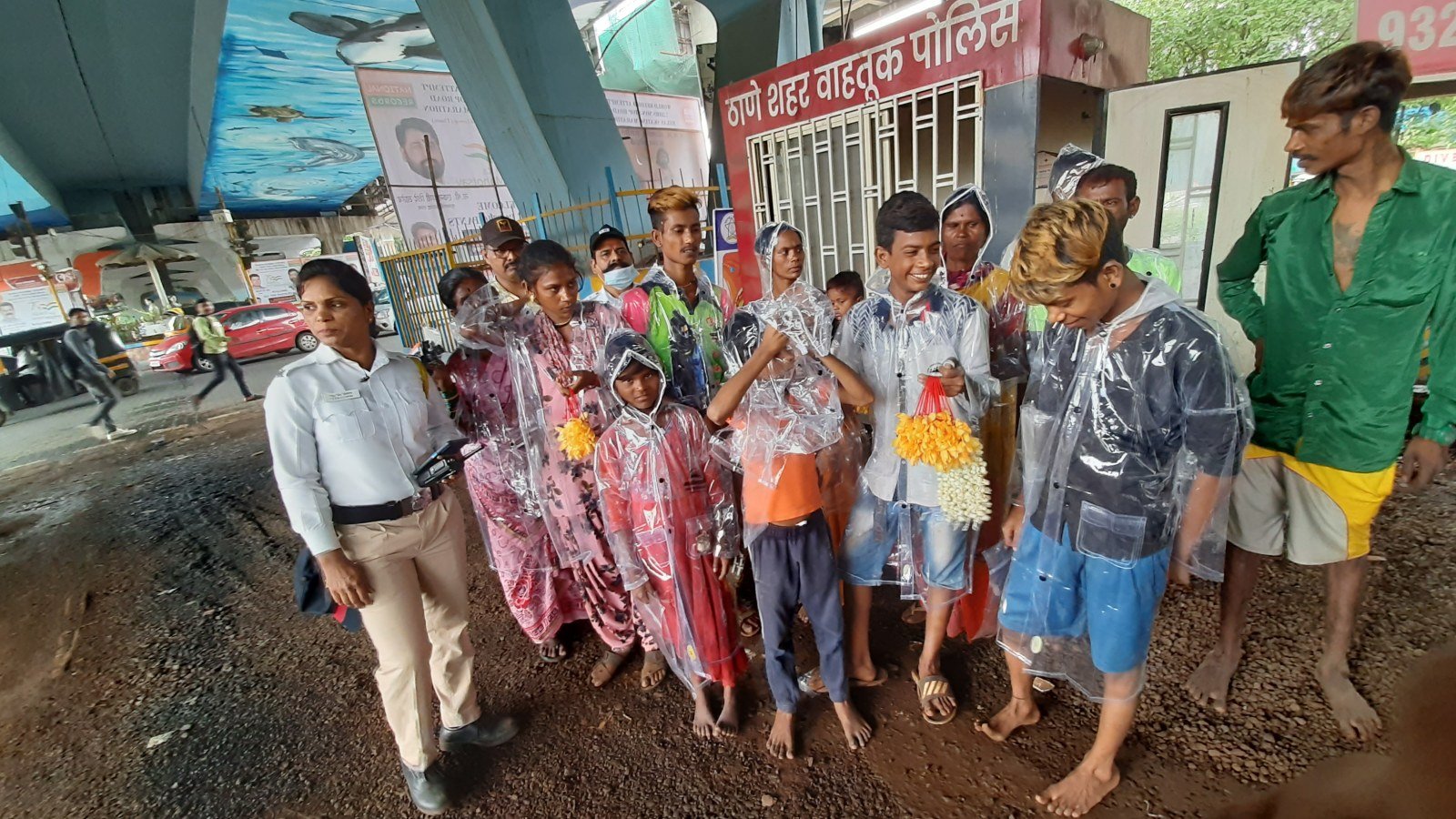 Distribution of Raincoats to underprivileged kids