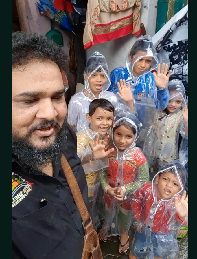 Distribution of Raincoats to Underprivileged  Kids at slums